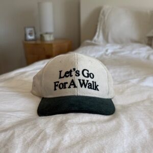yellow the label White and Green 'Let's Go For A Walk' Cap